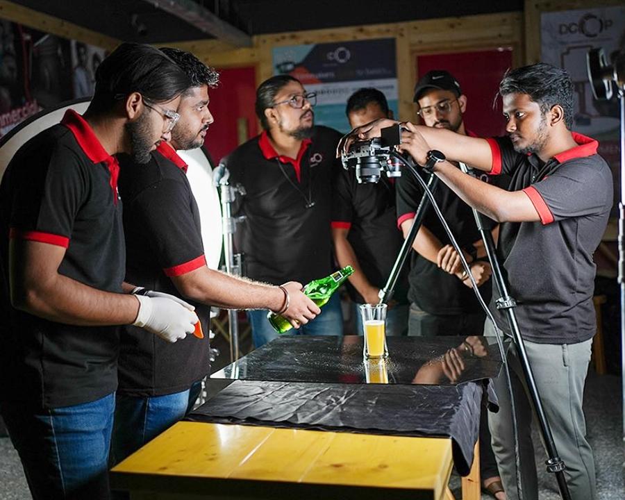 DCOP students filming a beverage setup for a commercial video exercise