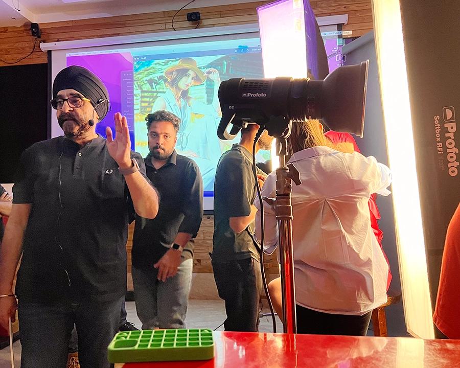 SPS Kalra leading a fashion photography lighting workshop for DCOP students