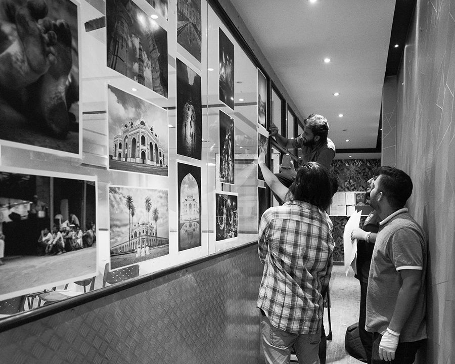 Creator's Pro students reviewing photographs for post-production and portfolio development