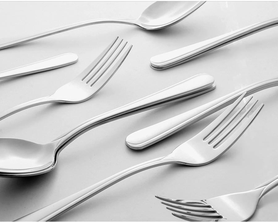 Polished metal cutlery photographed to demonstrate reflection control on specialist surfaces