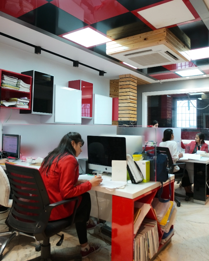 DCOP office space with staff workstations, iMac computers and meeting desks