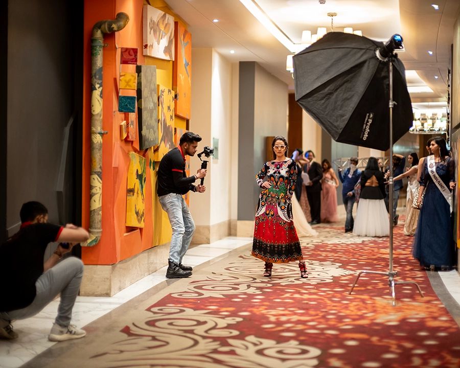 DCOP student photographing a fashion event